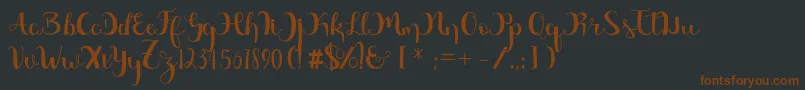 Magnificent Free Font – Brown Fonts on Black Background