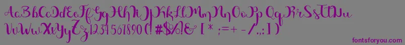 Magnificent Free Font – Purple Fonts on Gray Background