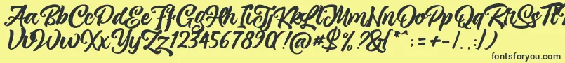 Fonte magnison Script Free – fontes pretas em um fundo amarelo