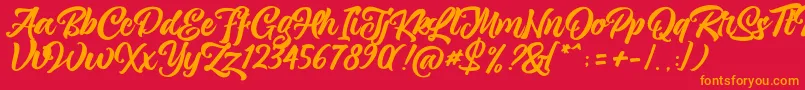 magnison Script Free Font – Orange Fonts on Red Background