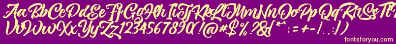 magnison Script Free-fontti – keltaiset fontit violetilla taustalla