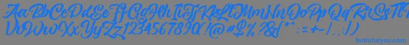 フォントmagnison Script Free – 灰色の背景に青い文字