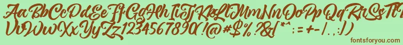 Czcionka magnison Script Free – brązowe czcionki na zielonym tle