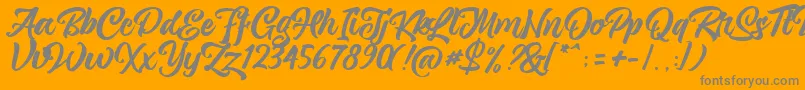 Fonte magnison Script Free – fontes cinzas em um fundo laranja