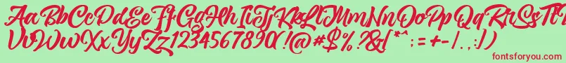 magnison Script Free Font – Red Fonts on Green Background