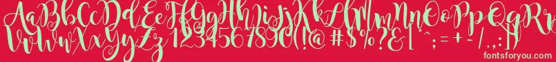 magnolia sky-Schriftart – Grüne Schriften auf rotem Hintergrund