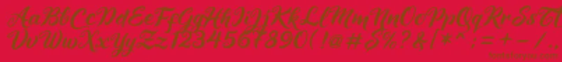Maheera Font – Brown Fonts on Red Background