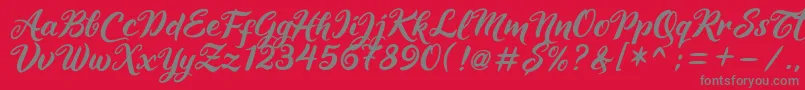 フォントMaheera – 赤い背景に灰色の文字
