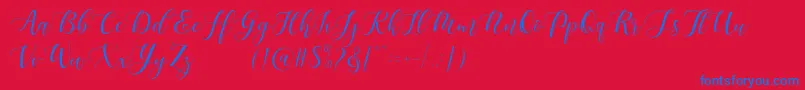 Шрифт Maheisa Script Free – синие шрифты на красном фоне
