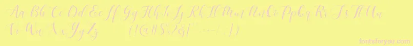 Fonte Maheisa Script Free – fontes rosa em um fundo amarelo