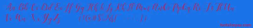 Maheisa Script Free Font – Red Fonts on Blue Background