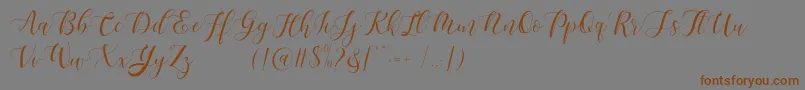 fuente Maheisa Script Free – Fuentes Marrones Sobre Fondo Gris