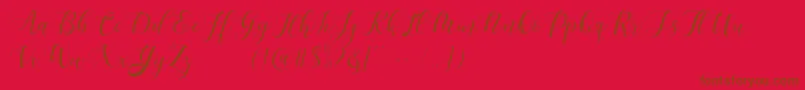 Maheisa Script Free Font – Brown Fonts on Red Background