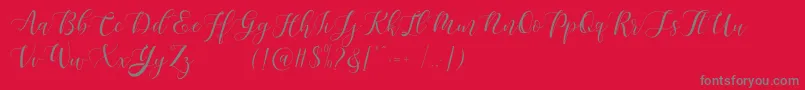 Maheisa Script Free Font – Gray Fonts on Red Background