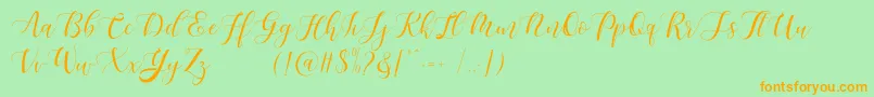 Maheisa Script Free-Schriftart – Orangefarbene Schriften auf grünem Hintergrund