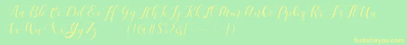 Maheisa Script Free Font – Yellow Fonts on Green Background