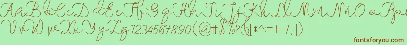 maheishia Font – Brown Fonts on Green Background