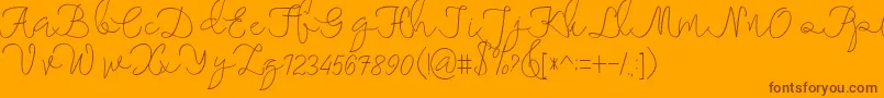 maheishia Font – Brown Fonts on Orange Background