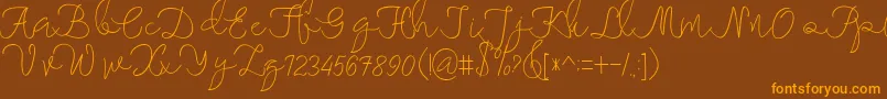 maheishia Font – Orange Fonts on Brown Background