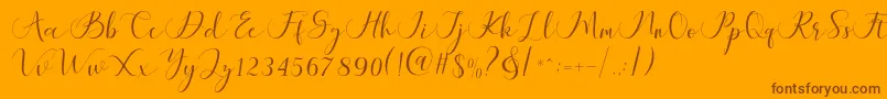 Maheria Script-Schriftart – Braune Schriften auf orangefarbenem Hintergrund