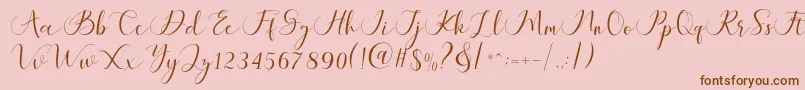 Maheria Script-Schriftart – Braune Schriften auf rosa Hintergrund