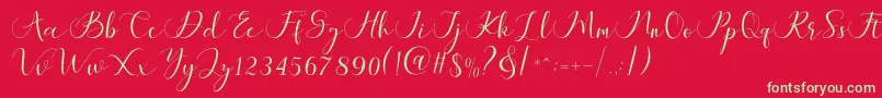 フォントMaheria Script – 赤い背景に緑の文字