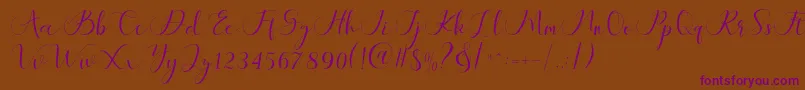 Шрифт Maheria Script – фиолетовые шрифты на коричневом фоне