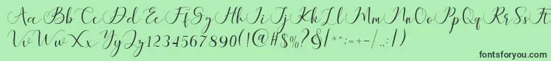 Fonte Maheria Script – fontes pretas em um fundo verde