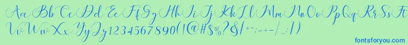 Czcionka Maheria Script – niebieskie czcionki na zielonym tle