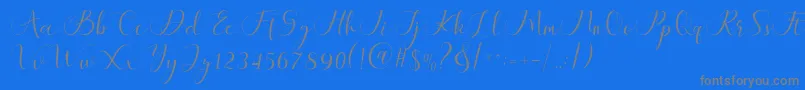 Maheria Script-Schriftart – Graue Schriften auf blauem Hintergrund