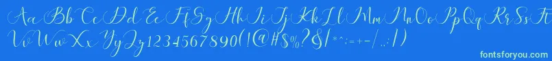 Maheria Script Font – Green Fonts on Blue Background