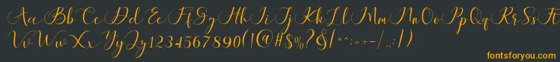 Fonte Maheria Script – fontes laranjas em um fundo preto