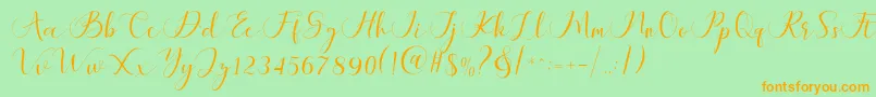 Fonte Maheria Script – fontes laranjas em um fundo verde