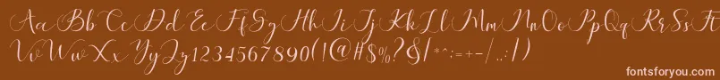 フォントMaheria Script – 茶色の背景にピンクのフォント