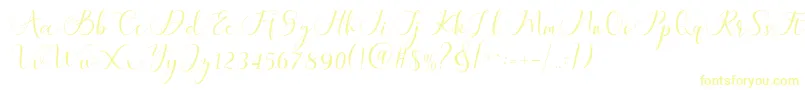 フォントMaheria Script – 白い背景に黄色の文字