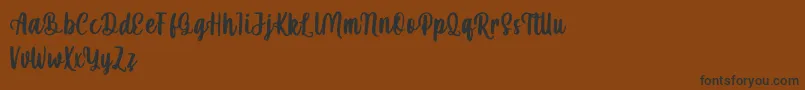 mahira demo Font – Black Fonts on Brown Background