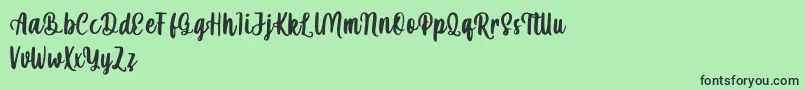 mahira demo-Schriftart – Schwarze Schriften auf grünem Hintergrund