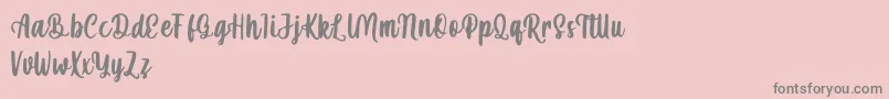 mahira demo-Schriftart – Graue Schriften auf rosa Hintergrund