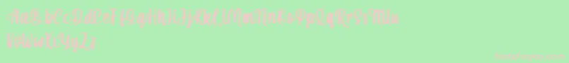 mahira demo-fontti – vaaleanpunaiset fontit vihreällä taustalla