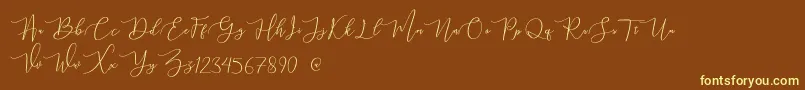 mahligai Demo Font – Yellow Fonts on Brown Background