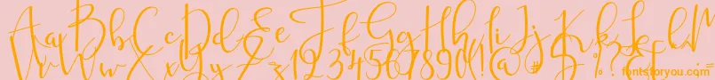 mahligai Font – Orange Fonts on Pink Background