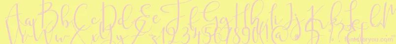 mahligai Font – Pink Fonts on Yellow Background