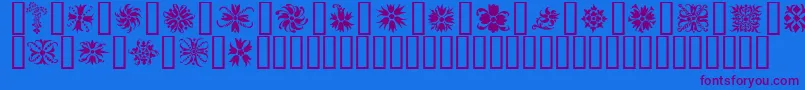 Ornamenter2-Schriftart – Violette Schriften auf blauem Hintergrund