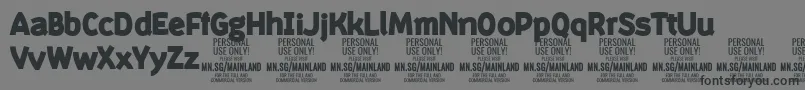 フォントMainlandBlack PERSONAL – 黒い文字の灰色の背景