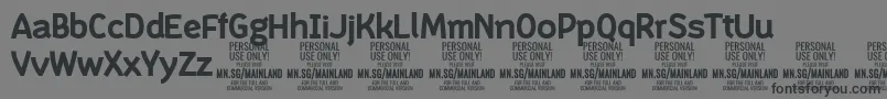 フォントMainlandBold PERSONAL – 黒い文字の灰色の背景