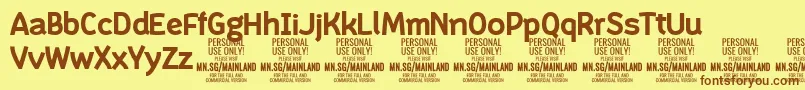 フォントMainlandBold PERSONAL – 茶色の文字が黄色の背景にあります。