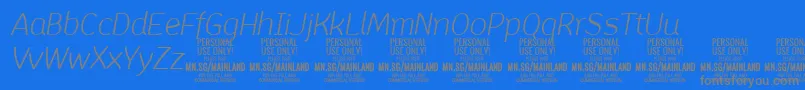 MainlandLightItalic PERSONAL-fontti – harmaat kirjasimet sinisellä taustalla
