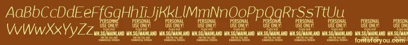 Fonte MainlandLightItalic PERSONAL – fontes amarelas em um fundo marrom