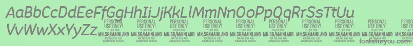 MainlandMediumItalic PERSONAL Font – Gray Fonts on Green Background