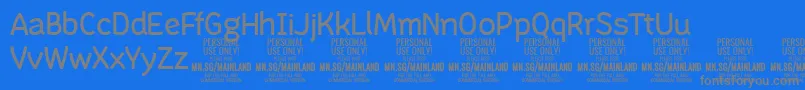 MainlandRegular PERSONAL Font – Gray Fonts on Blue Background